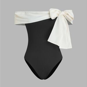 Cider Black Bodysuit with Asymmetrical Design and White Bow Detail